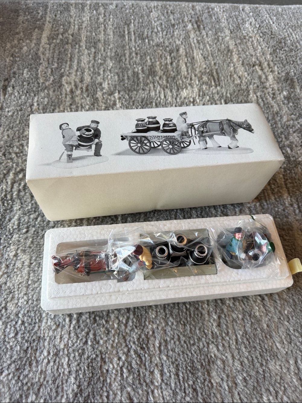 Vintage Department 56 “ a new potbellied stove for Christmas” figurine set